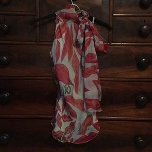 “Love is Life” DVF top with tie closure at neck.